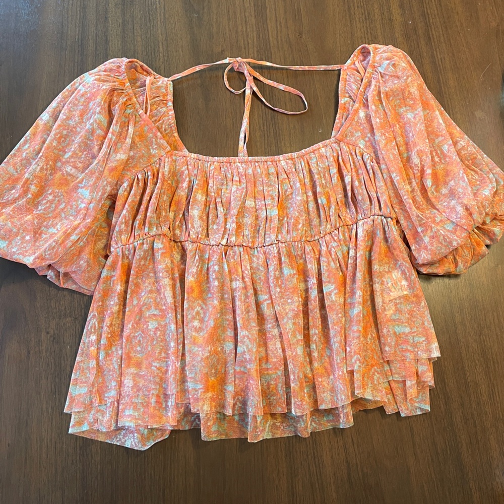 Free People Penelope Printed Smocked Peplum Top in Peach Combo